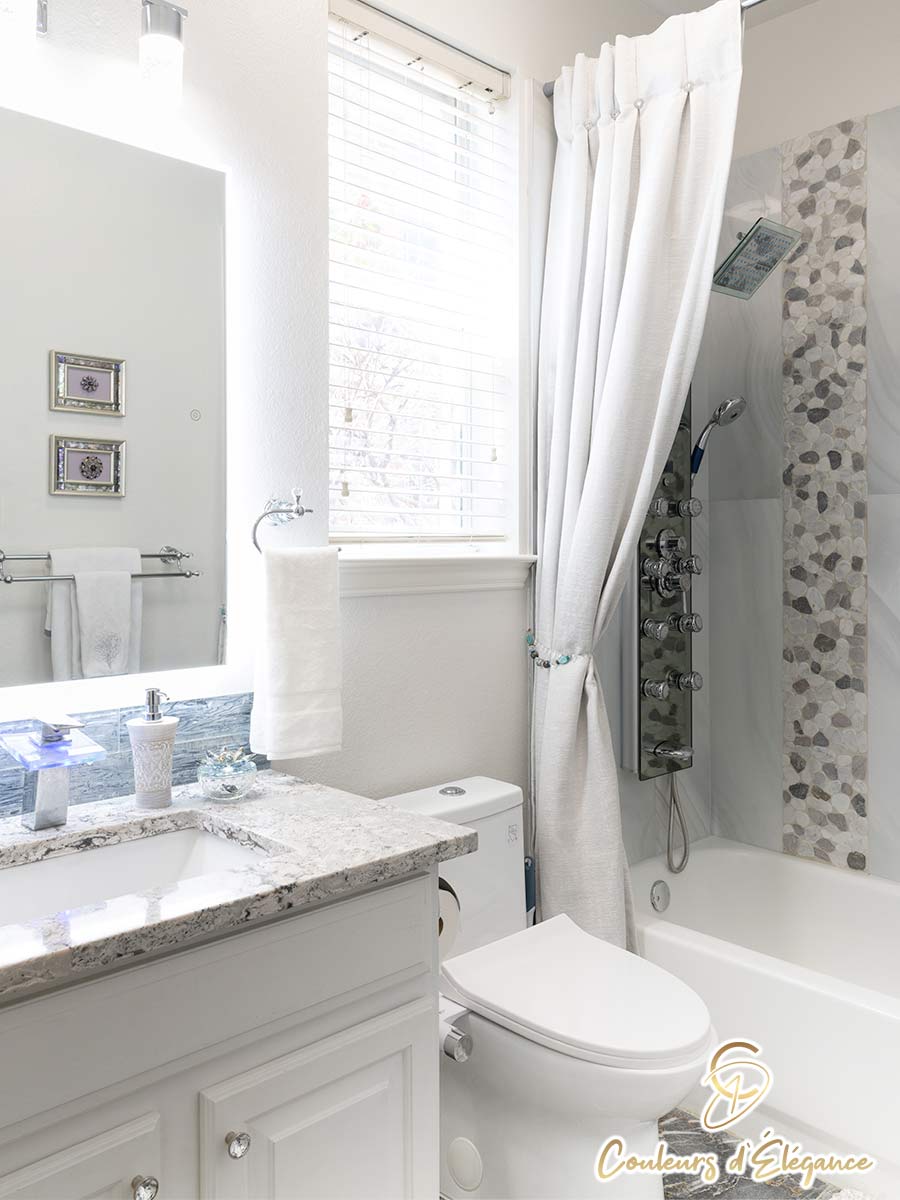 A redesigned bathroom featuring a fancy multi-functional shower.